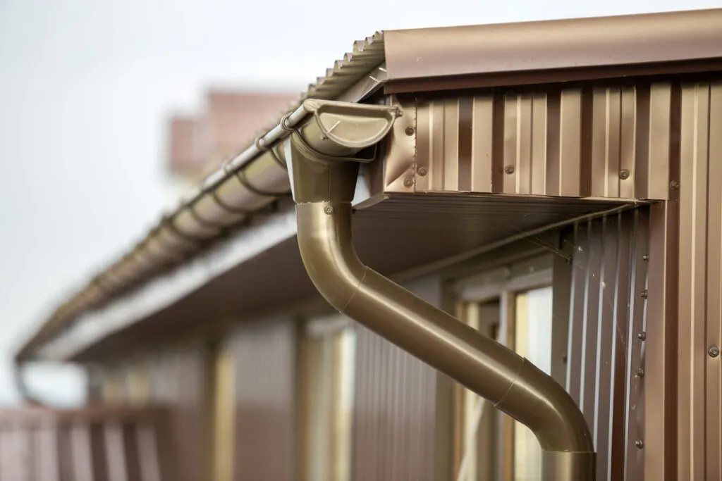 Ensuring proper slope away from the building