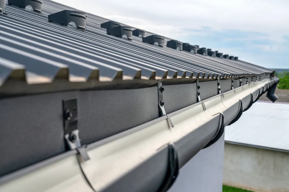 Metal roof and gutter system on house